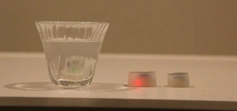 Each cube is comprised of a colored LED, an accelerometer, IR receivers, and a battery, which are molded into an edible, waterproof jelly