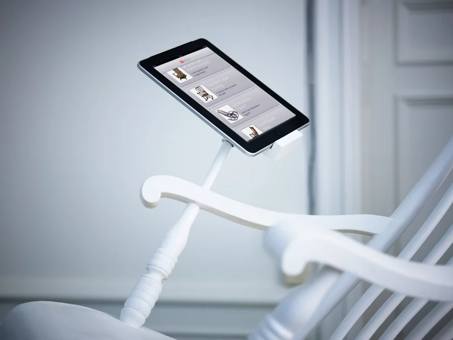 The iRock Rocking Chair features an arm-mounted iPad dock