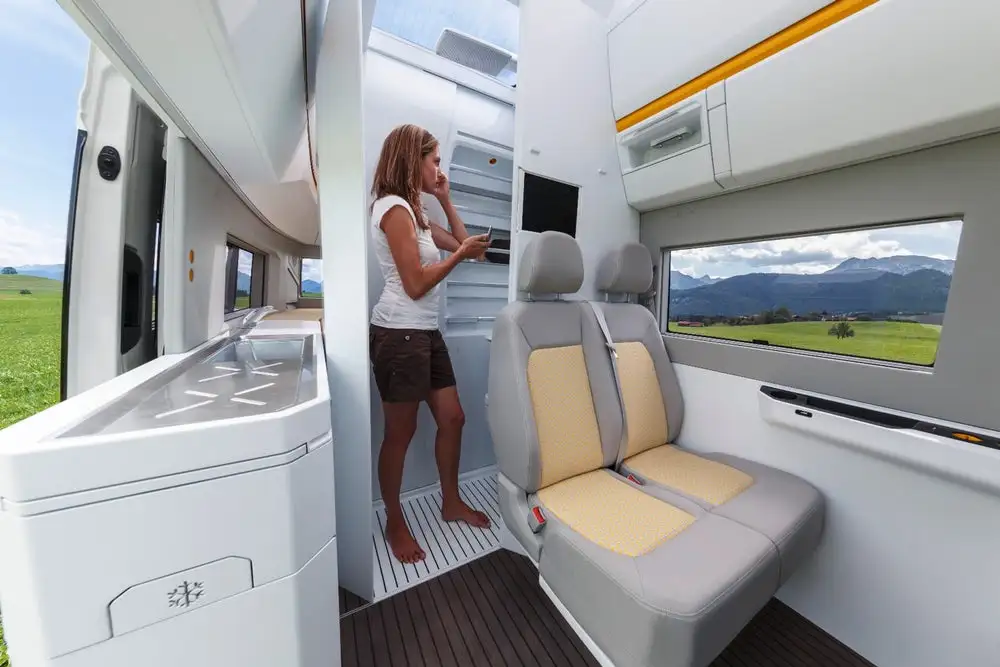 The slide-out bathroom is one of the big highlights of the California XXL, offering added bathroom space when you need and clearing space when you don't. Along with a flip-up countertop/privacy divider, the pull-out also serves to separate the living area and rear bedroom