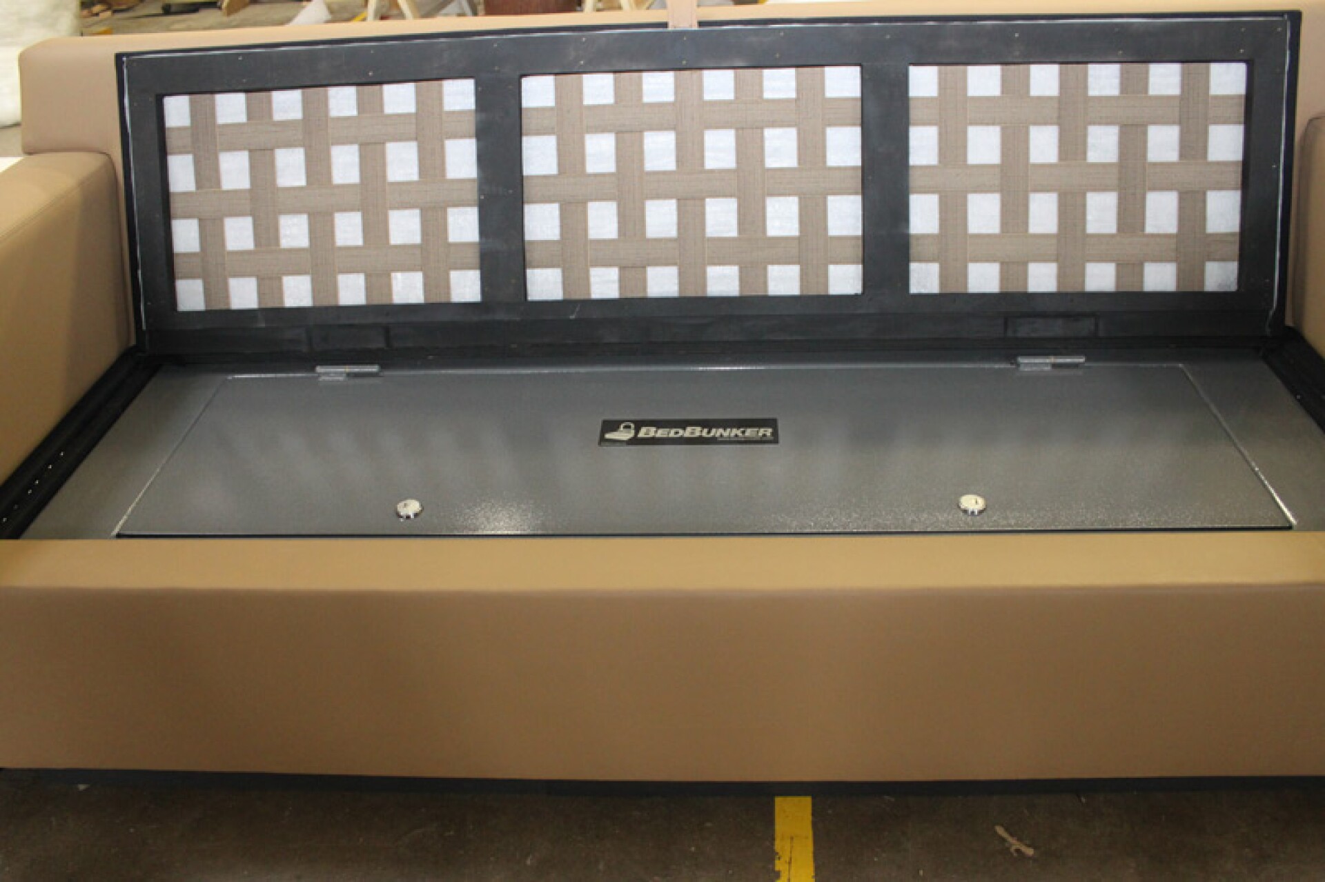 CouchBunker conceals a gun safe beneath bulletresistant cushions