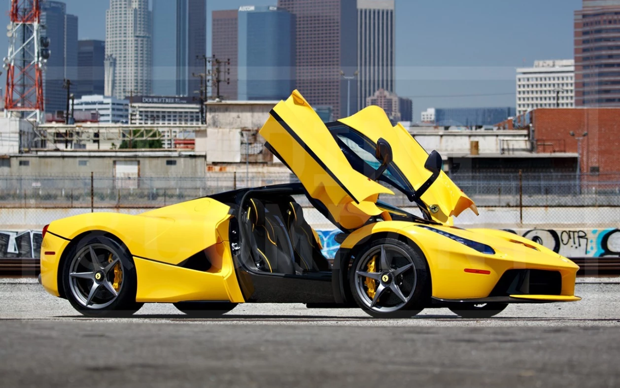 This 2015 Ferrari LaFerrari is estimated to sell for between $3,300,000 and $3,900,000. It has a top speed of 217 mph (350 km/h) and with just 200 miles on it, this car is essentially new. The 6.3L hybrid drive V-12 engine develops 949 horsepower in total, with the hybrid power unit comprising the most powerful naturally-aspirated V12 in the world (6.3 liters producing 788 hp) with a 161 hp electric motor for a total 949 hp transmitted via a 7-speed dual clutch gearbox with energy harvested via a HY-KERS Kinetic Energy Recovery System. Official Auction Page