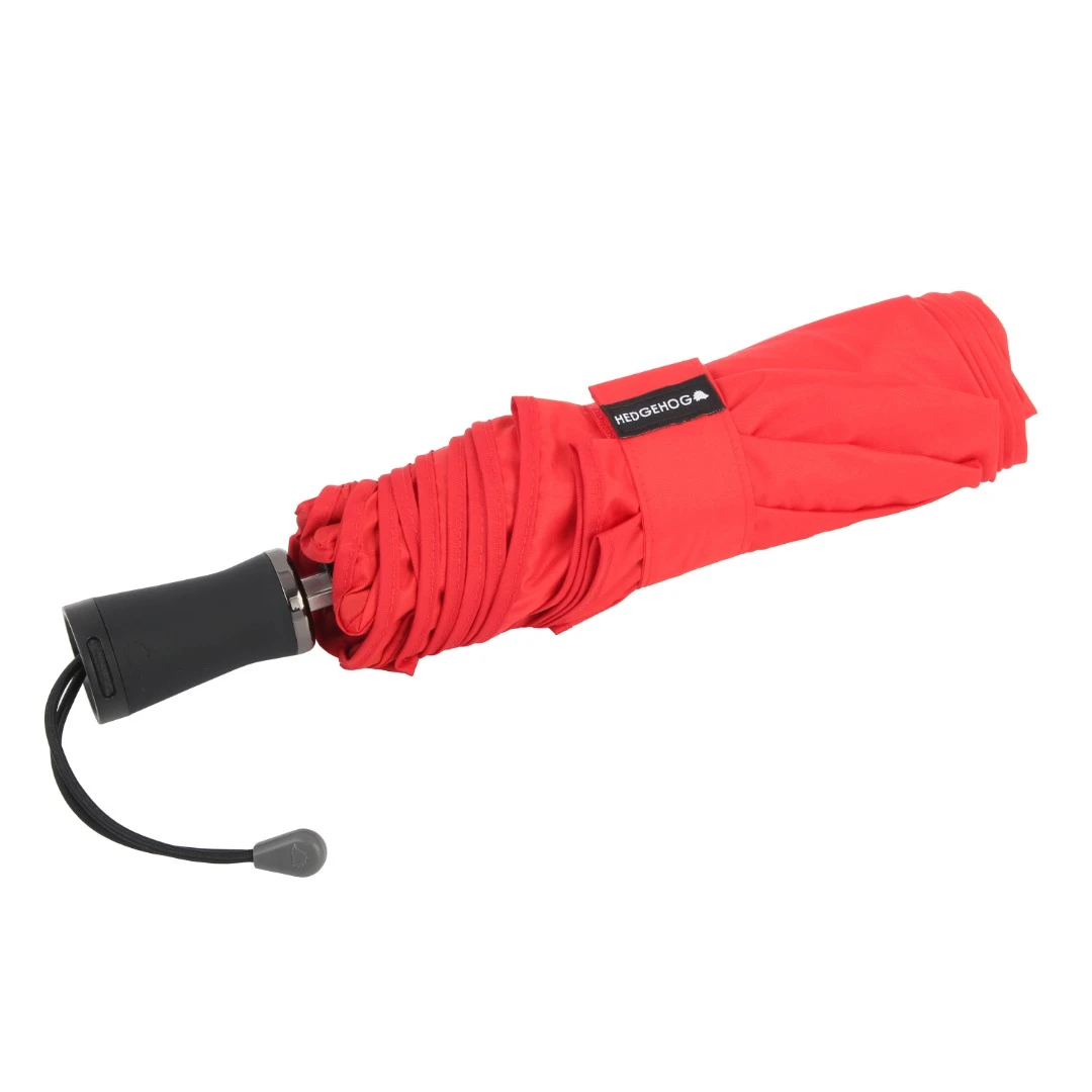 The Hedgehog Carbon umbrella folds down to 13 inches long, and has a built-in enclosure hidden within its hollowed out handle