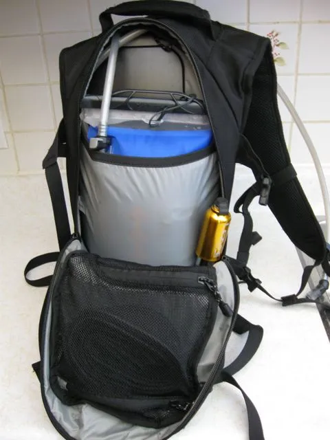 The GEIGERRIG bladder sits in a separate nylon pouch within the pack, leaving room for gear such as a bike pump and extra tube (in the mesh pocket)