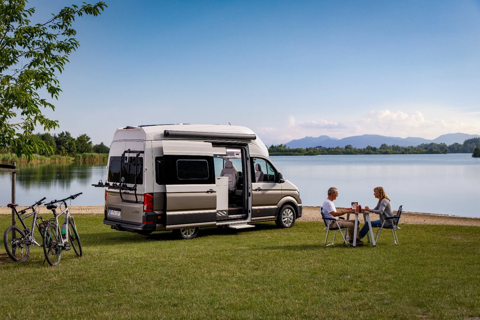With its rear bed and optional bunk bed, the Grand California can support both couple and family vacations and adventures. VW will offer an optional outdoor table and chairs that store away neatly in the doors