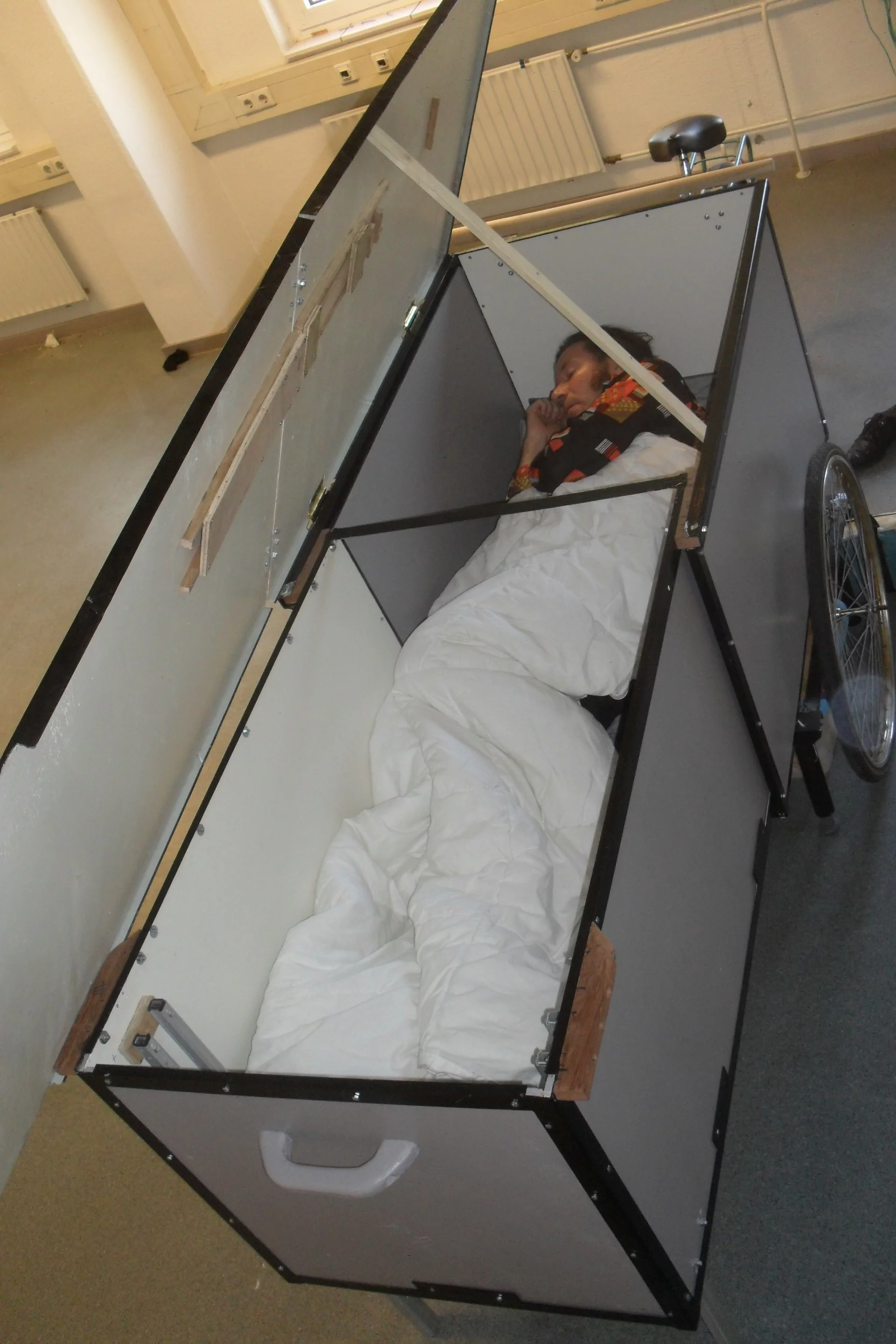 The occupant can close and lock the two roof sections for added security and weather protection