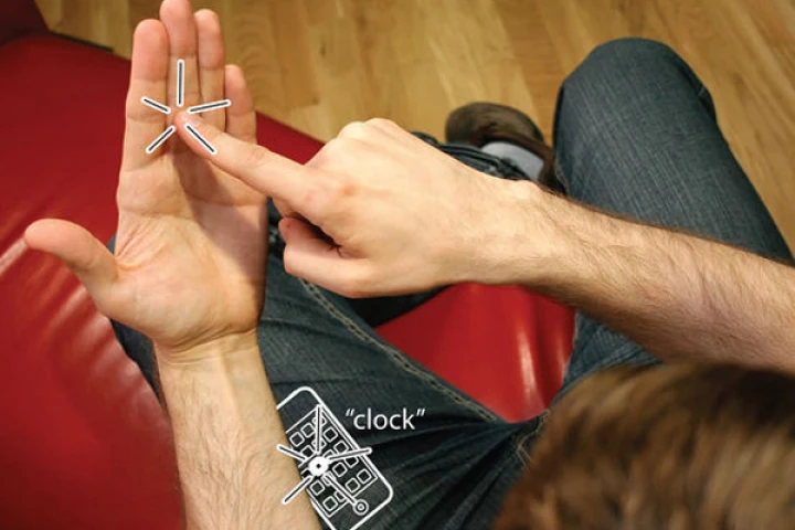 The "imaginary phone" recognizes gestures and the position of keys on your phone so you can perform simple smart phone tasks without taking it out of your pocket (Image: Hasso Plattner Institute)