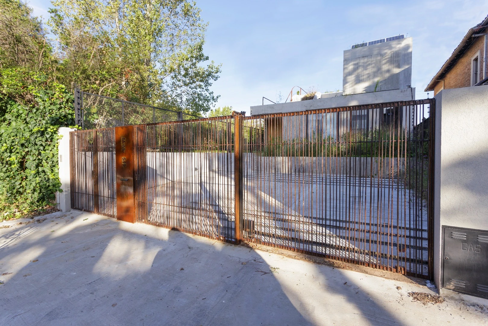 In a nice touch, the MeMo House's gate was made from leftover materials