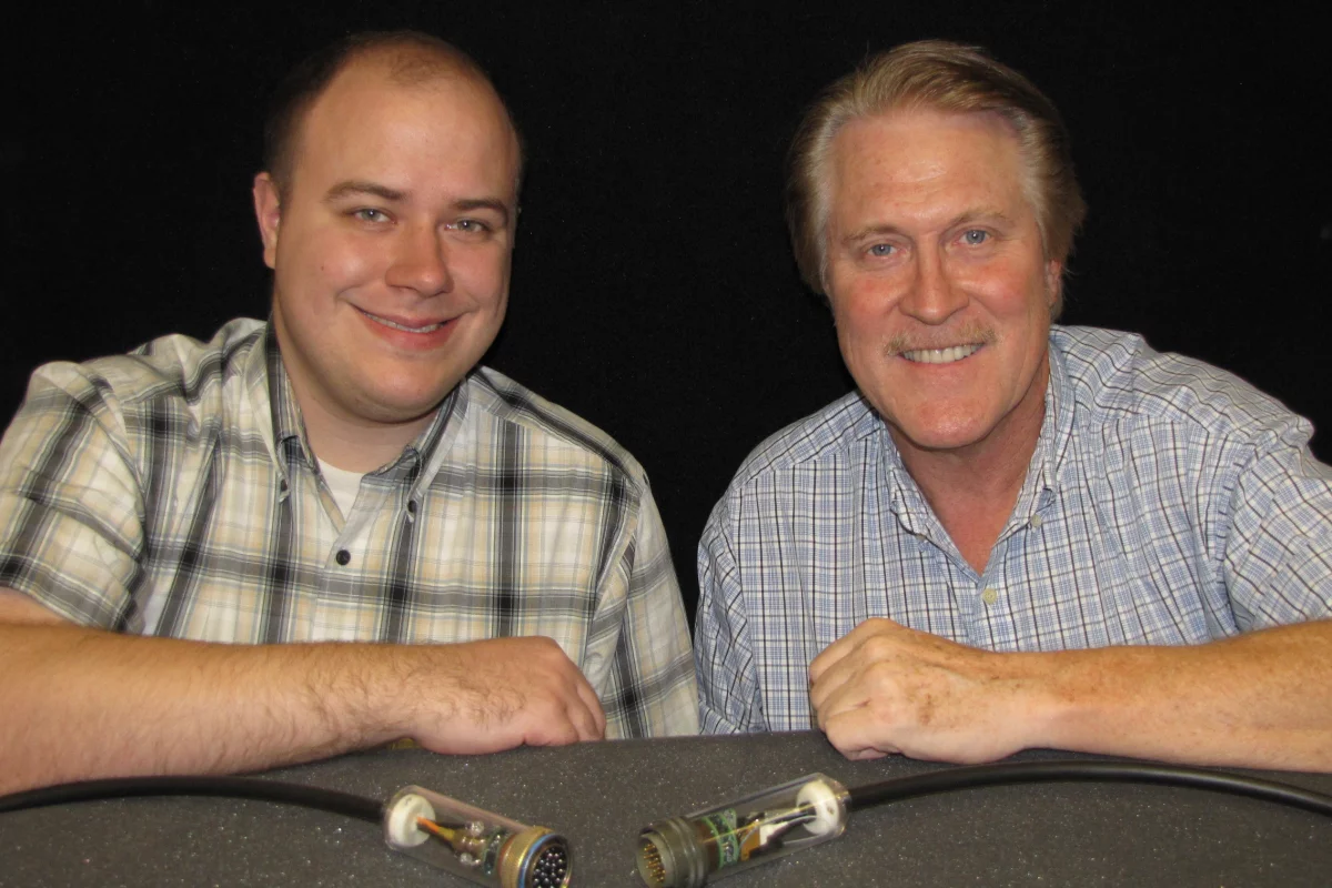 Titus Appel (left) and Steve Sanderson, with their power-over-fiber communications cable
