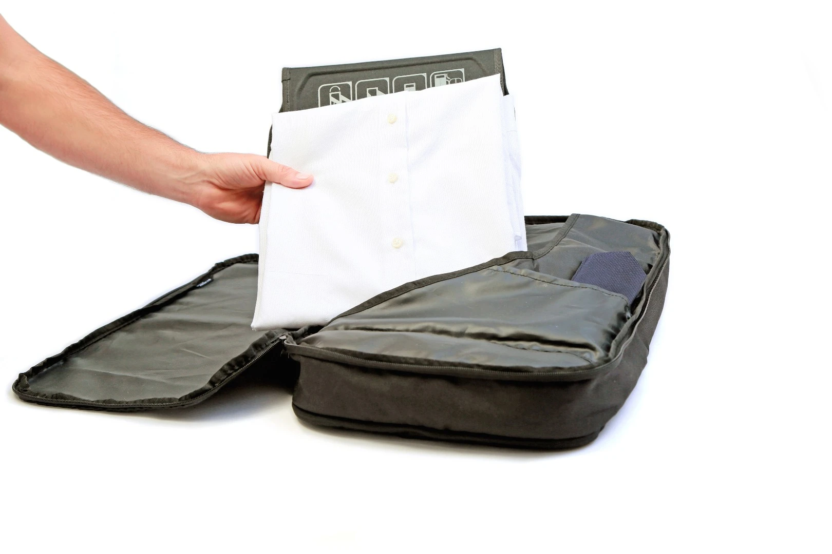 The Slicks Trip Cover has multiple inserts and pockets for shirts and other items