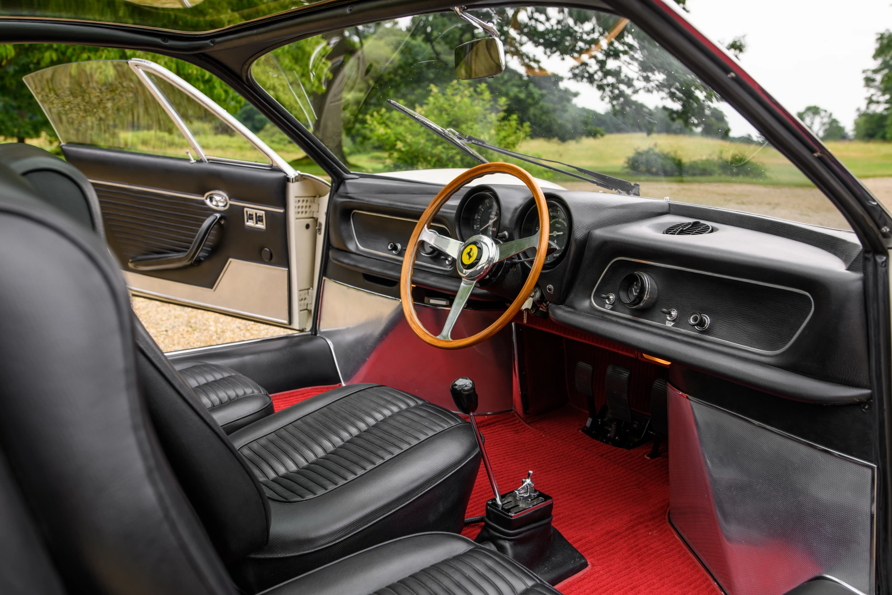 The Ferrari 365P Speciale's three-seat design was as unique and ingenious then as it is now. Professor Gordon Murray thought it so clever that he also used it in another landmark automobile, the McLaren F1. The advantages are that it enables two passengers to be seated comfortably (with oodles of leg-room) instead of just one, but even more importantly, it preserves the unique and uncompromised central driving position of single seat racing cars.