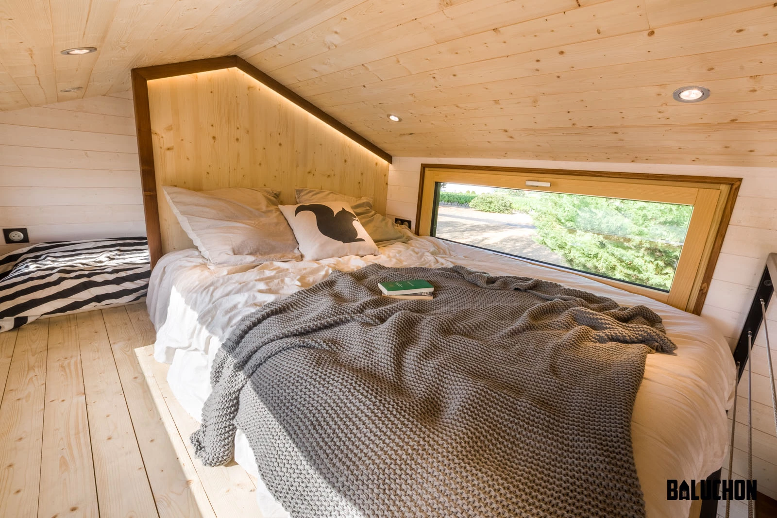 The Hauméa tiny house's two bedrooms are squeezed into one loft space