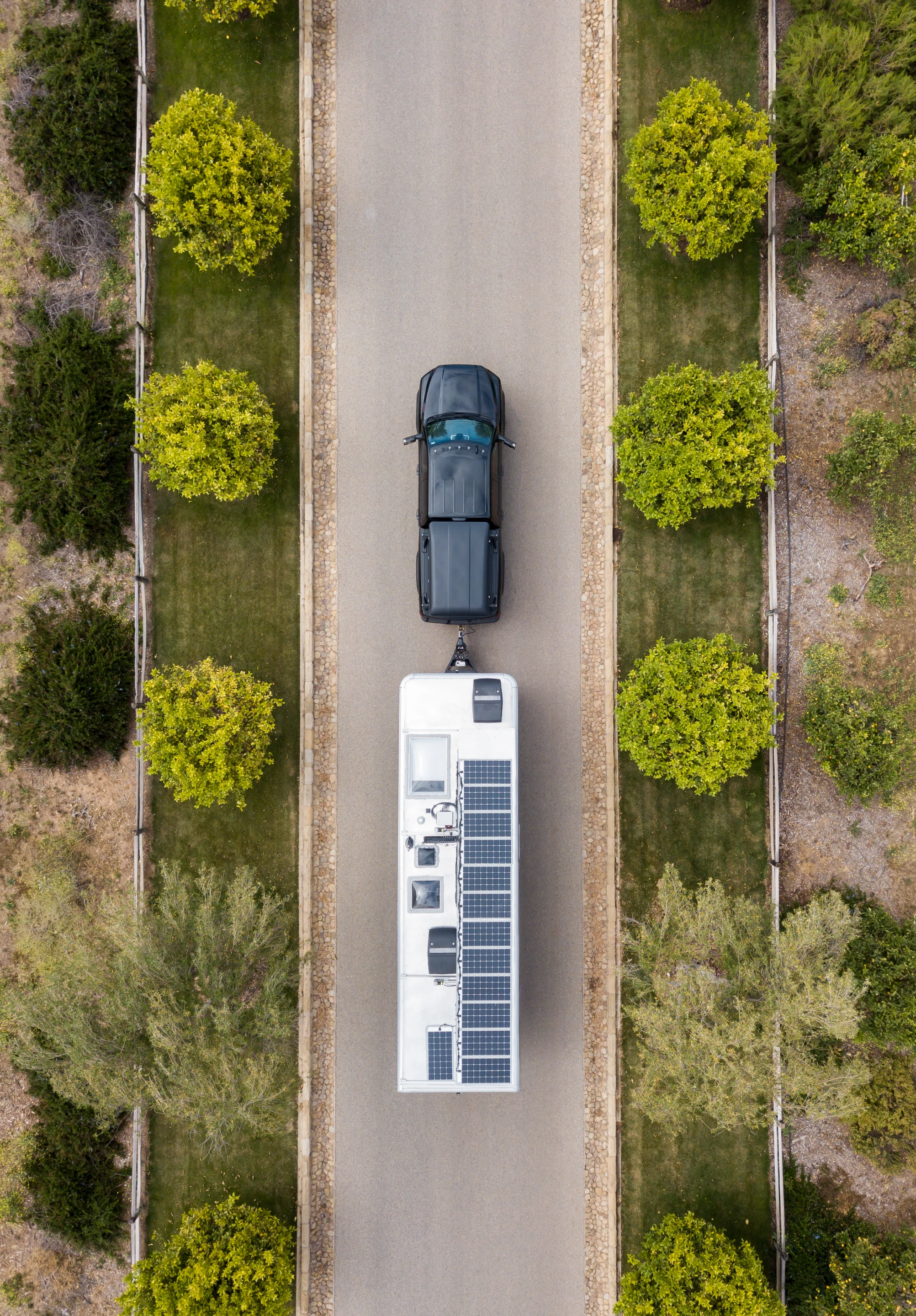 Bird's-eye view of the Living Vehicle 2022 on the road