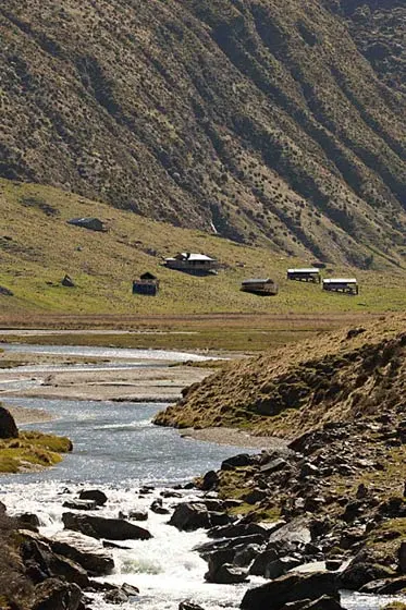 The dramatic surrounding landscape is suitable for hiking or fly-fishing in pristine rivers