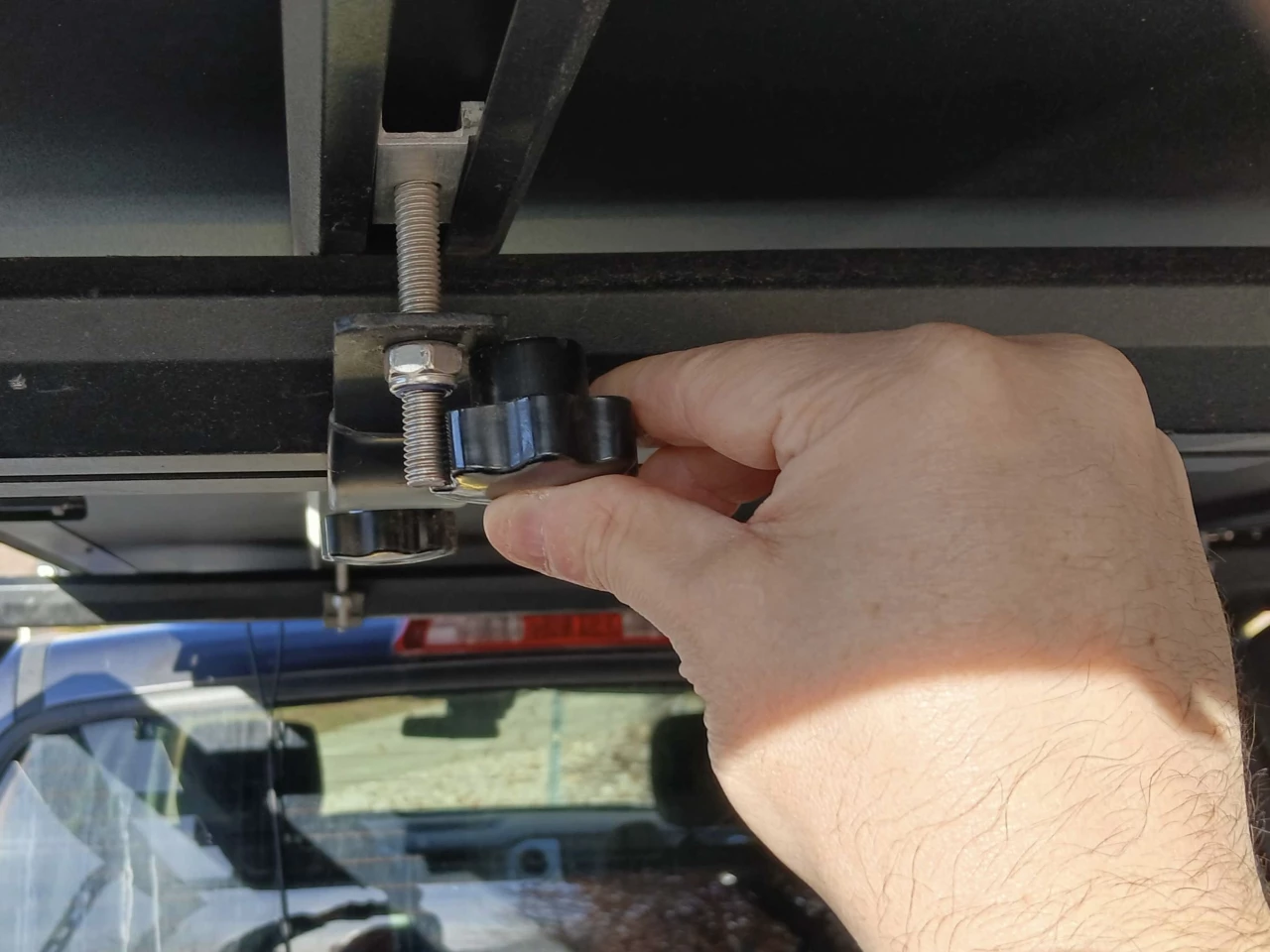 Here you can see the quick-release nut is the same height as the remaining bolt