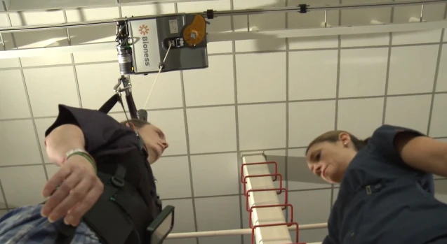 The Vector Gait and Safety System uses a track-mounted robotic trolley to keep patients from falling down