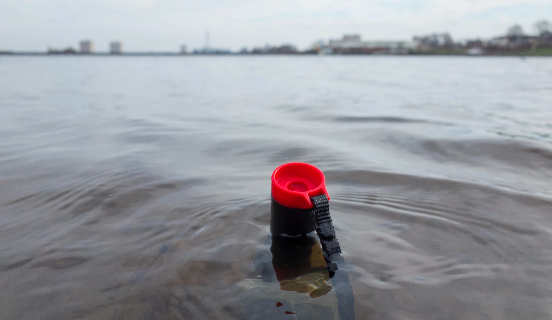 The Joby Action Grip floats, and the red end to the handle is easy to spot in the water
