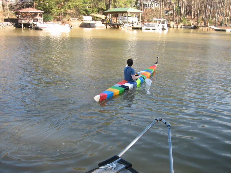 The 3D-printed kayak on the water