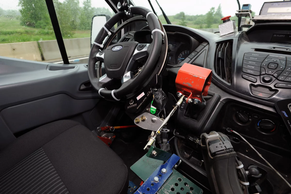 Ford's robotic testing system drives trucks and vans over test tracks without human drivers
