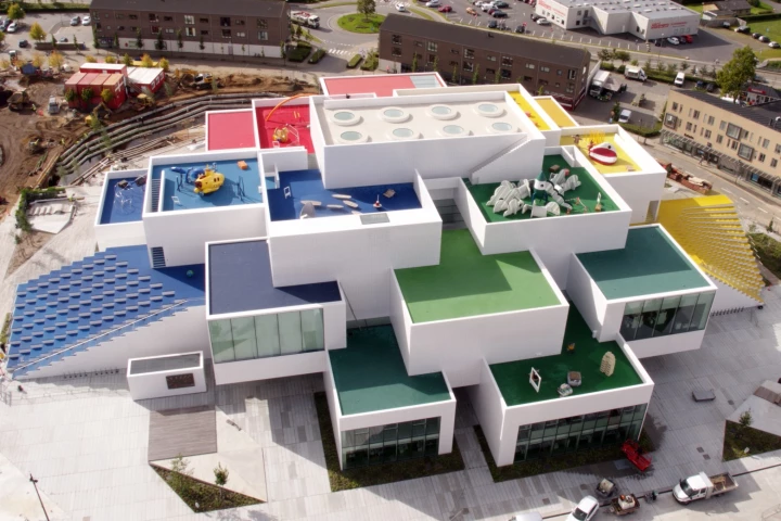 The Lego House appears to be constructed from oversized Lego bricks