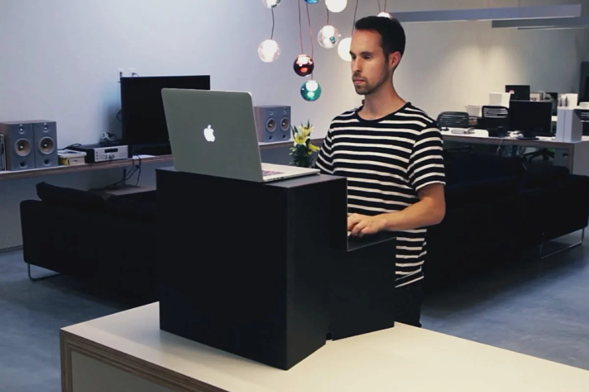 Oristand unfolds into a simple-yet-effective standing desk capable of accommodating most laptops, keyboards and mice