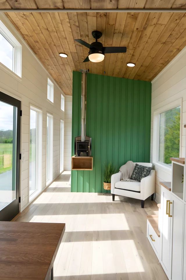 The Rutledge's open living room includes a small wood-burning stove