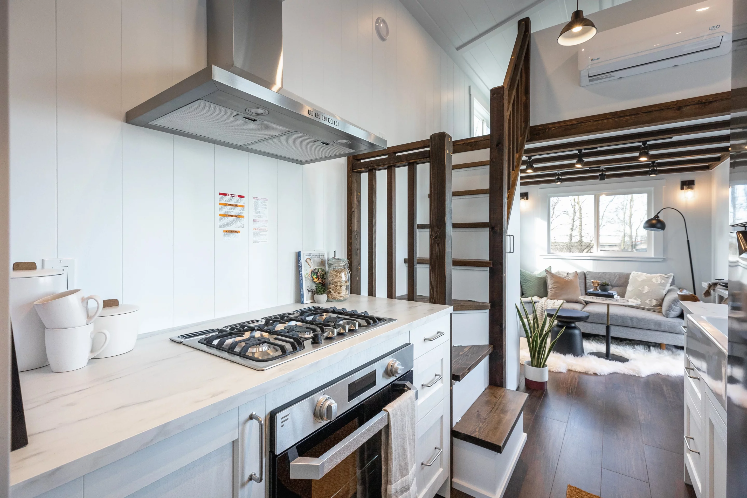 The Violet Edition – Scarlett Loft's kitchen has a propane-powered oven and three-burner stove