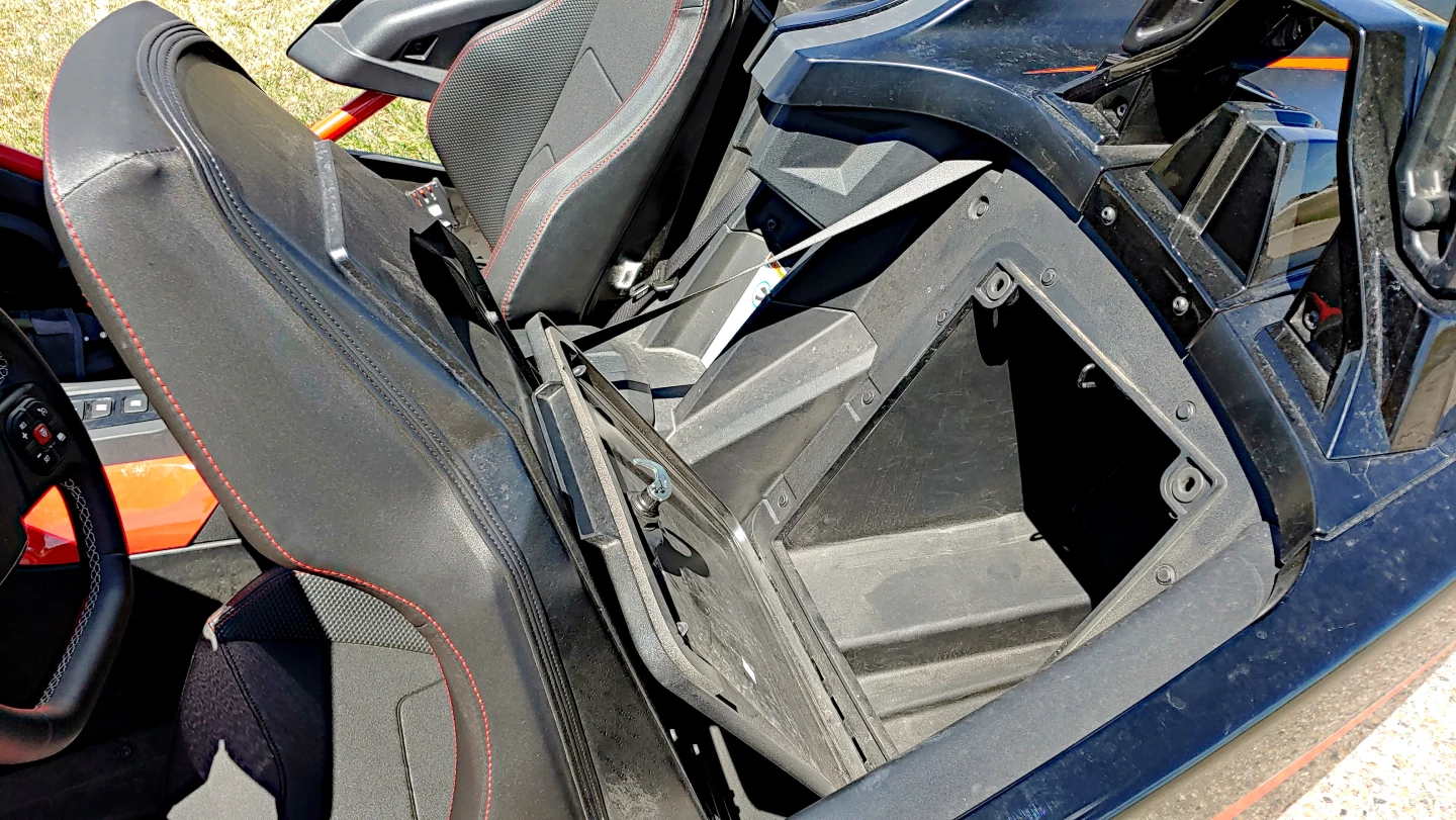 Behind both seats of the Polaris Slingshot are these cargo spaces, the passenger's side being slightly larger