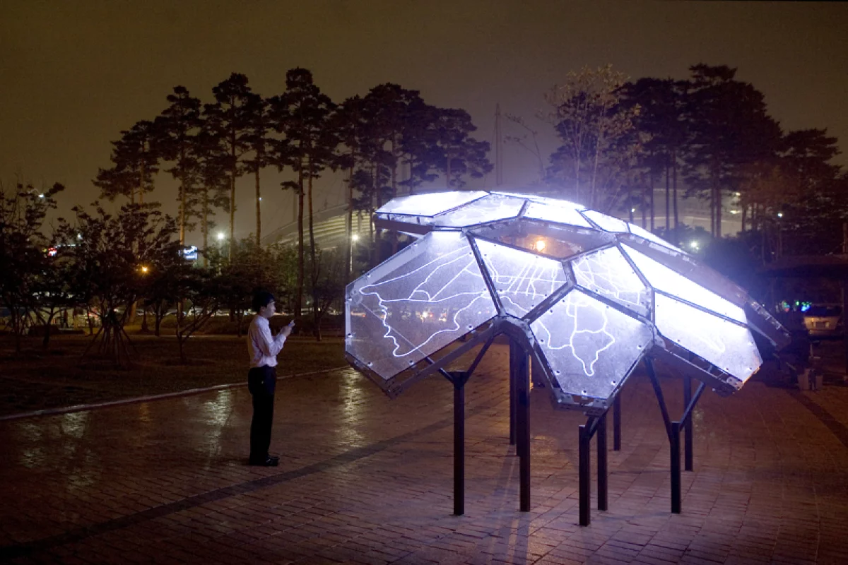 A user can send a text message to the structure, which then blinks to register receipt and replies with local air quality information