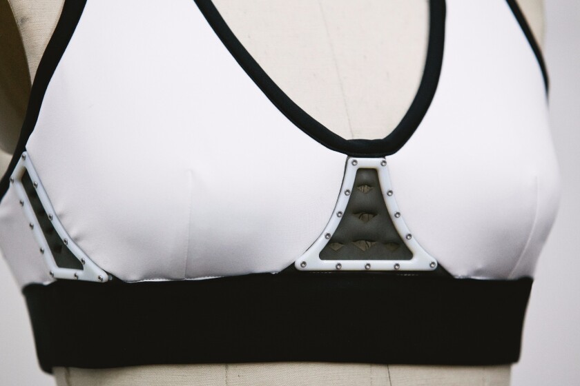 Vents in the Chromat Aeros Sports Bra open to provide a cooling air flow when changes in the wearer's perspiration, breathing and body temperature are detected