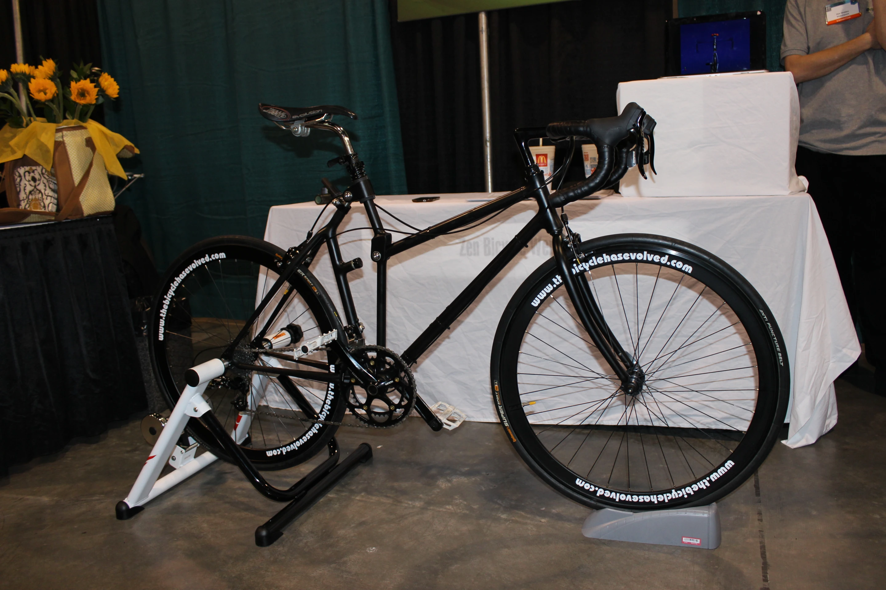 The Darwin Bicycle has a frame that folds forward with the rider, reportedly boosting their performance by allowing them to remain seated while sprinting and climbing