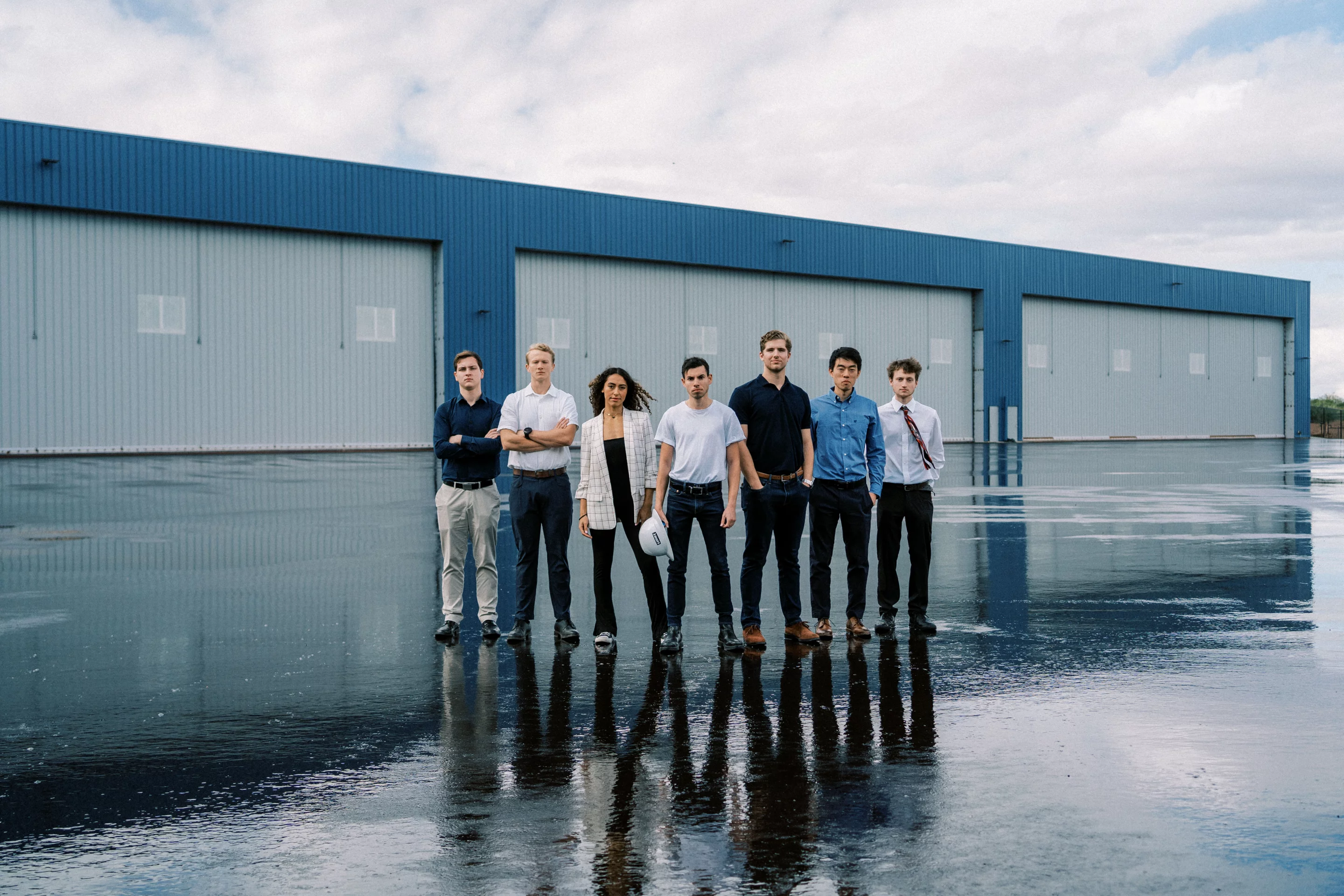 Christian LaRosa, center, with members of the Rosotics team, looking like they've just dropped a banger of a record