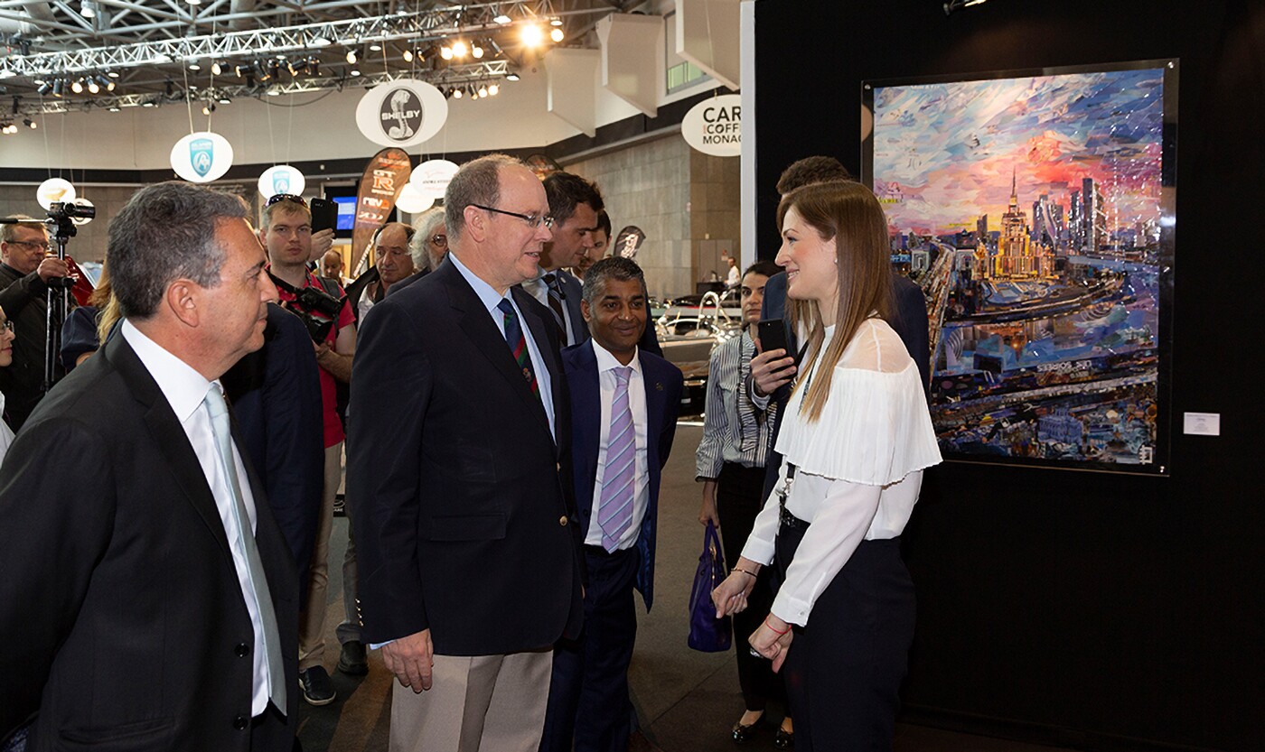 The presence and indeed enrolment of royalty is a trump card that no other show can offer, and as can be seen from Prince Albert meeting world famous Russian artist Daria Usova, whose work was on display at top Marques, though Daria was clearly nervous at first, she wasn't nervous for long.