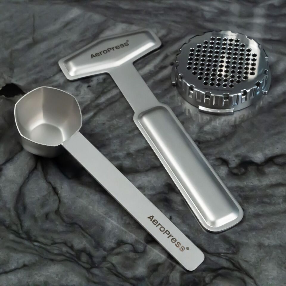 The Aeropress Premium kit includes a stainless steel scoop and stirrer