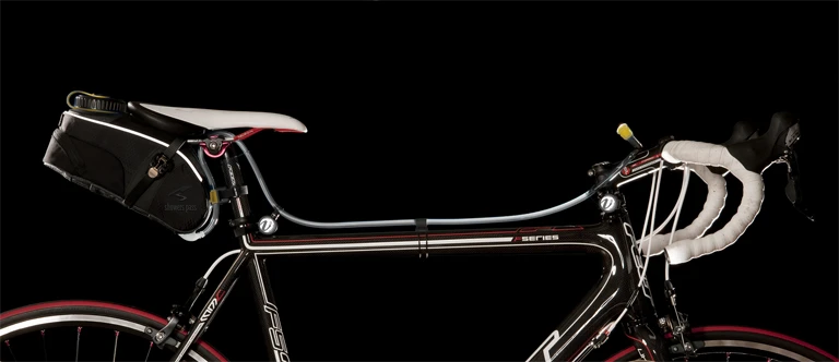 The VelEau is a cyclist's hydration system, that mounts on the bike instead of the rider