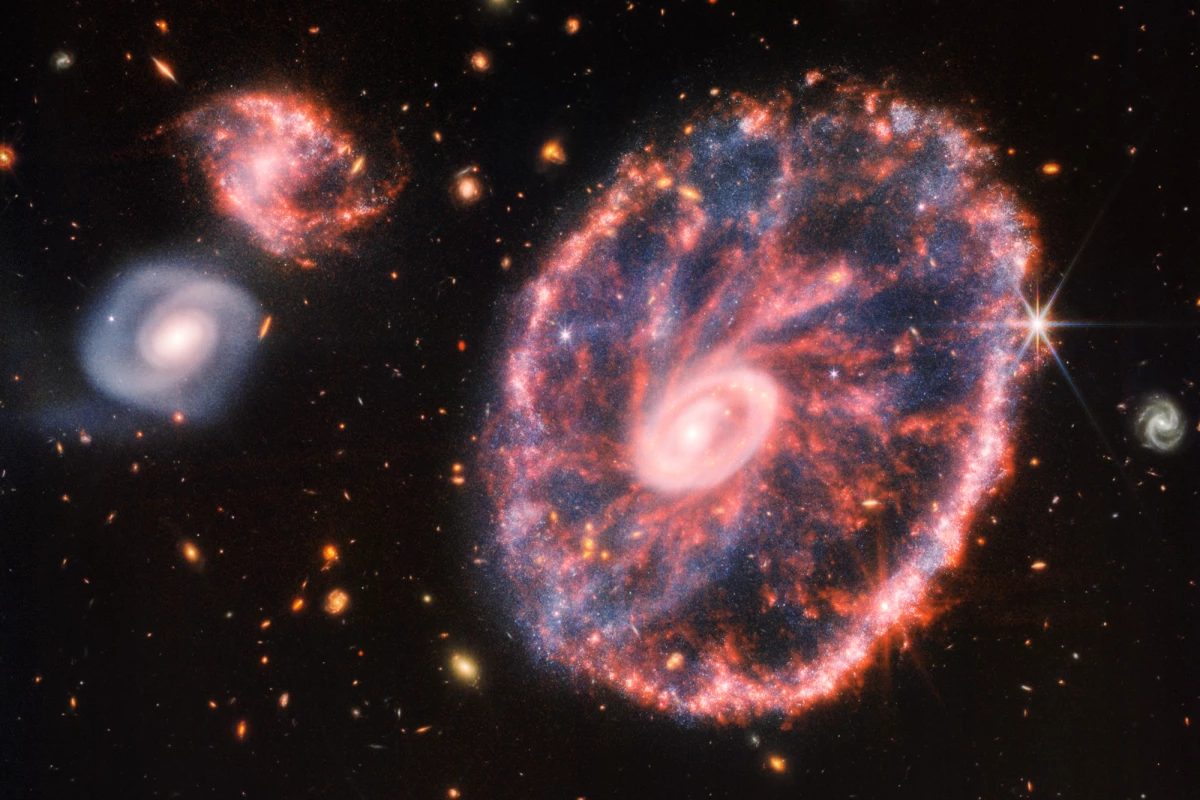 The James Webb Space Telescope has produced a stunning new view of what's known as the Cartwheel Galaxy