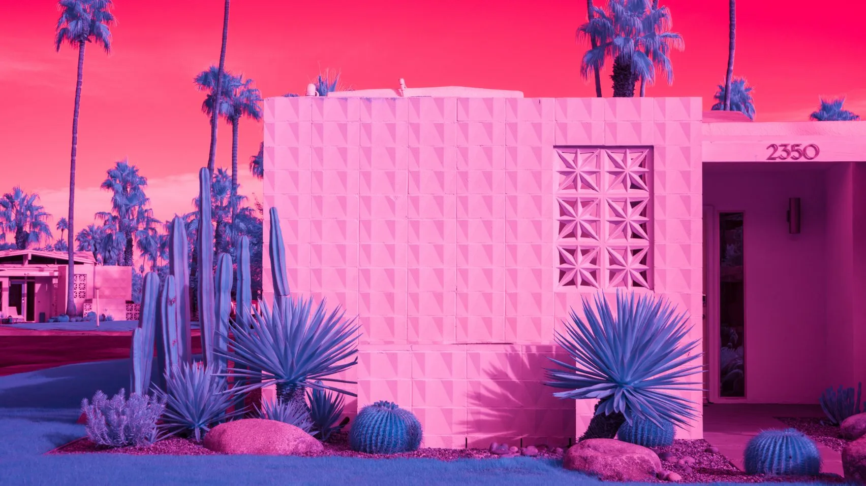 Kate Ballis’ series Infra Realism is an extreme, stylized take on the style contrasting images of classic mid-century Palm Springs architecture with jarringly sharp and disorientating infrared purples and reds
