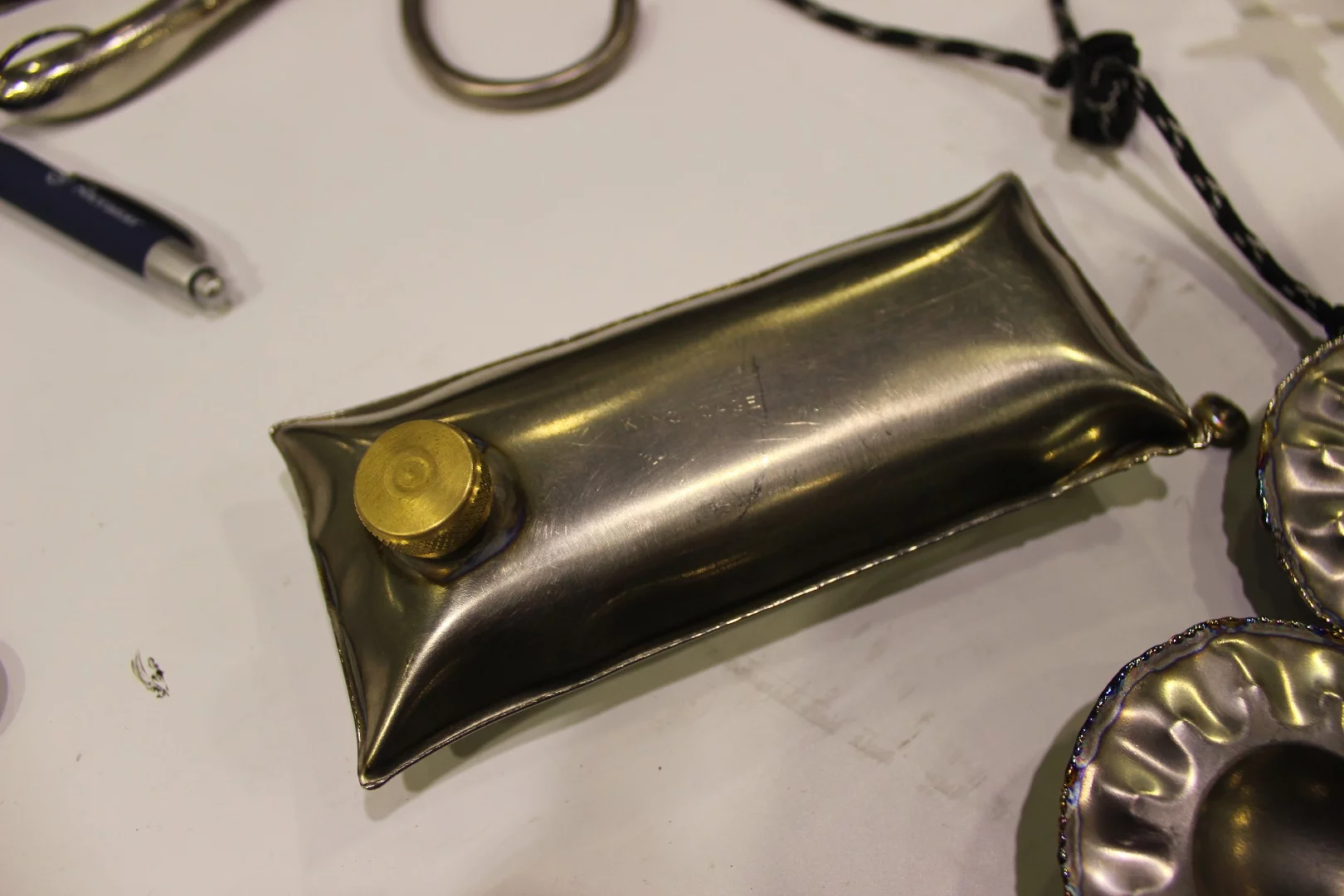 King Cage had this titanium flask on display