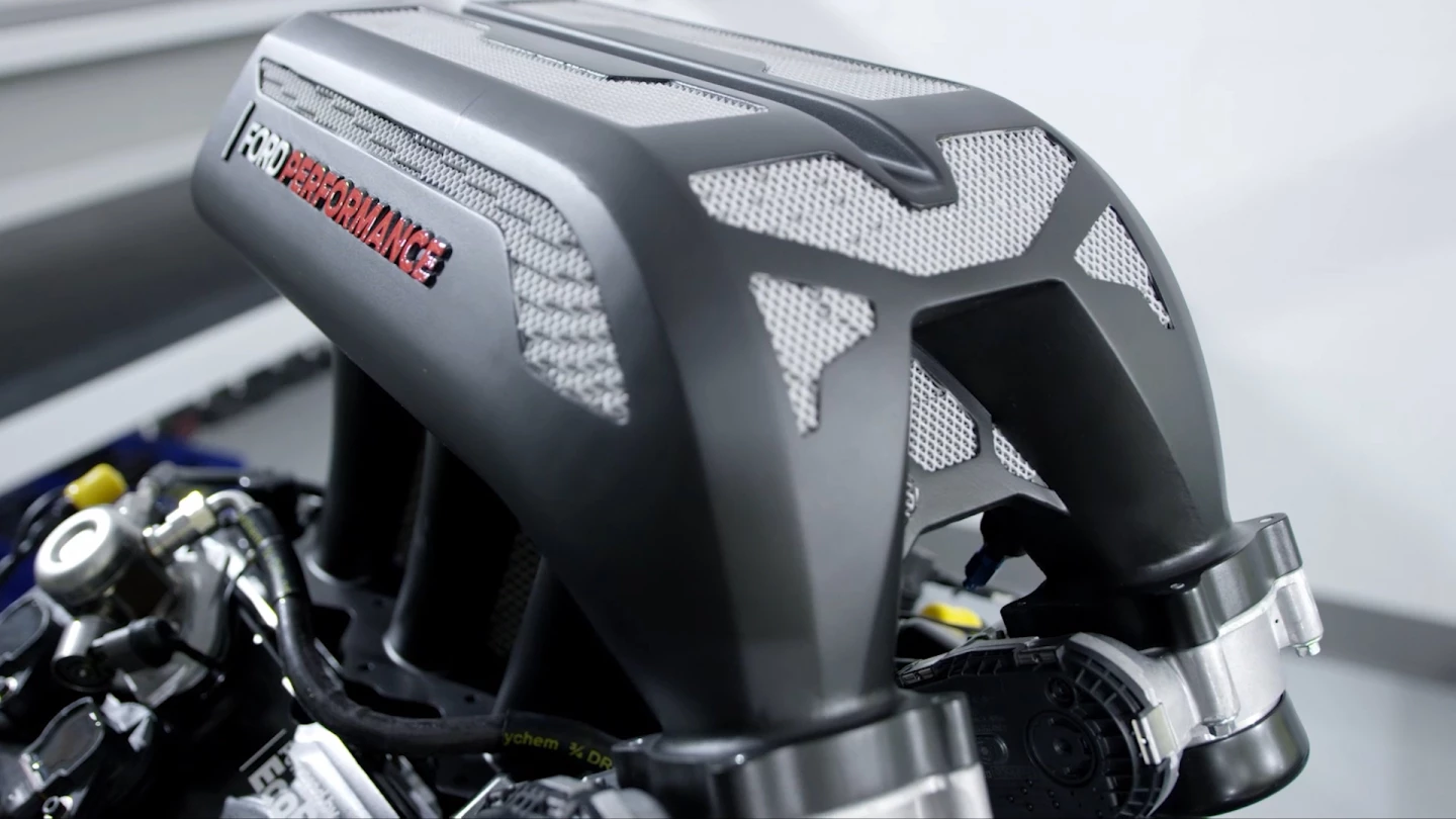 The 3D-printed aluminum intake manifold of the "Hoonitruck"