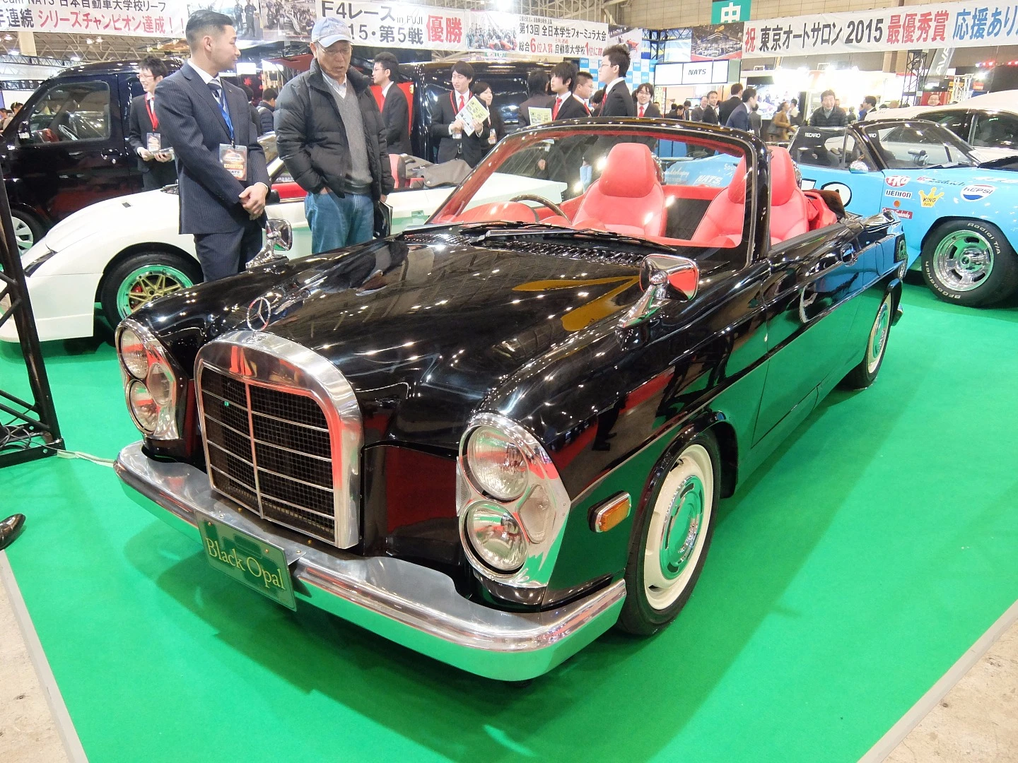 It looks like a1960 Mercedes-Benz SEL, but it's not - called the Black Opal Show-Spec, it is based on an old generation Daihatsu Copen