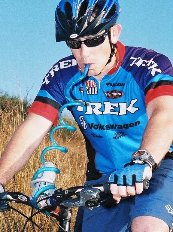 Keep both hands on the grips and drink on the move