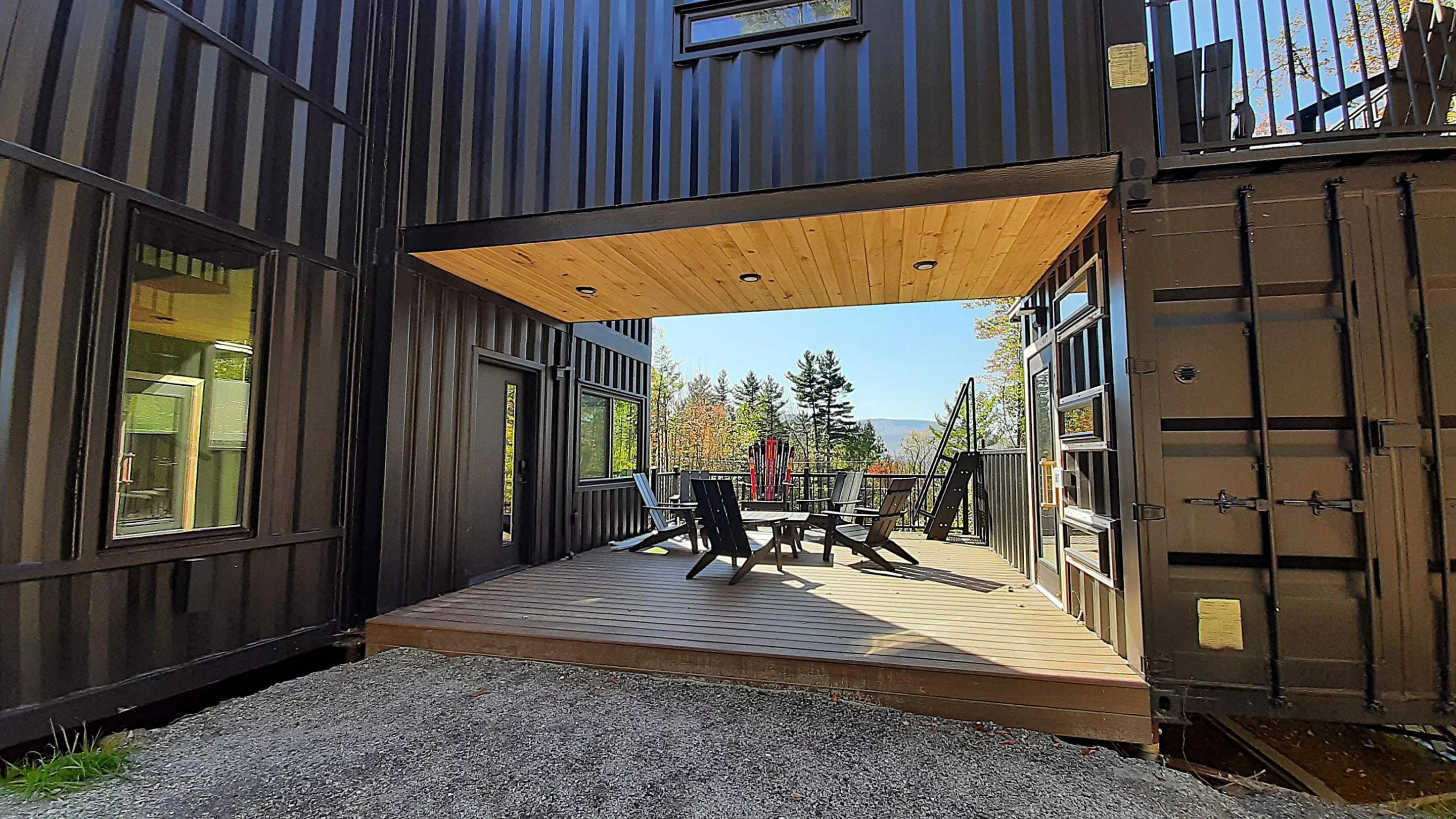 The Vermont Villa's shipping containers have been heavily modified and arranged to create multiple terrace areas