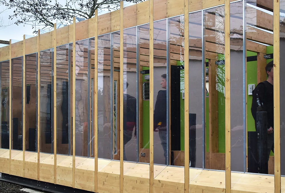 The greenhouse is supported on a steel frame and four hydraulic legs that lift simultaneously