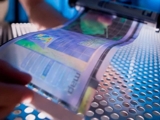 A flexible electronic display is rolled out at ASU's Flexible Display Center
