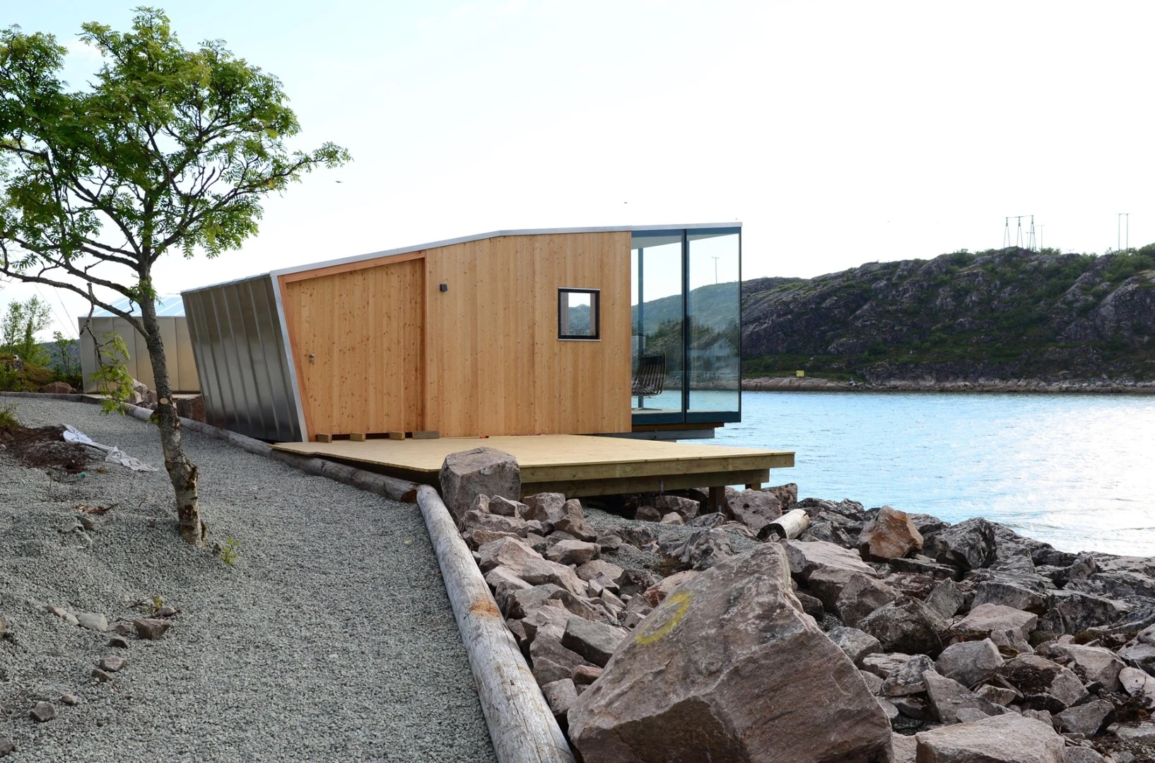 The cabins have a two-layer wooden construction, with an outer layer of larch that will turn silver-gray over time