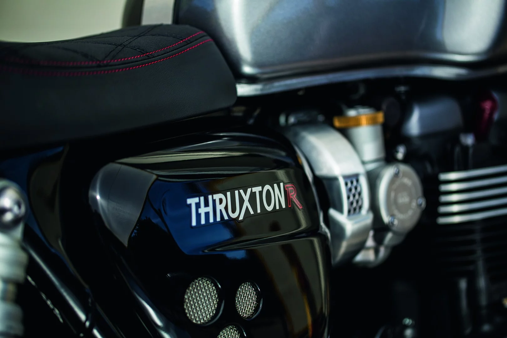 Perforated side cover for the Triumph Thruxton R