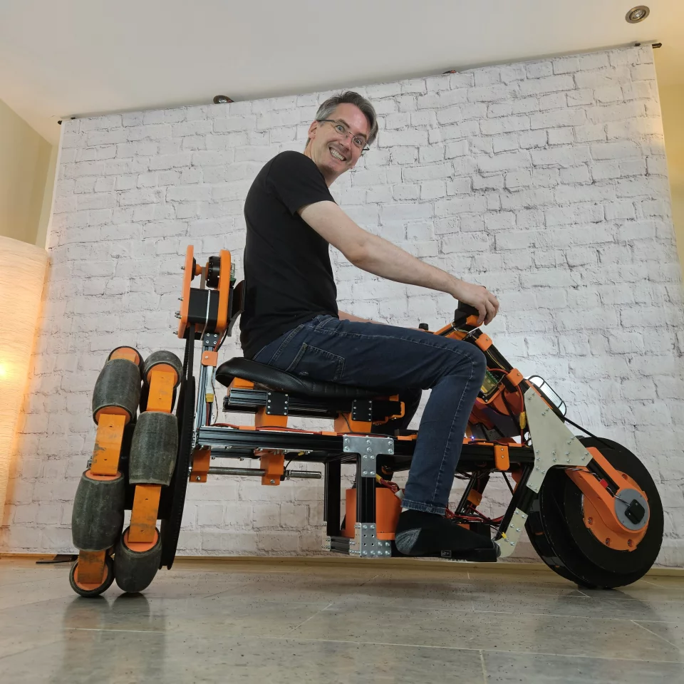 Self-balancing and omnidirectional electric bike controlled using joysticks