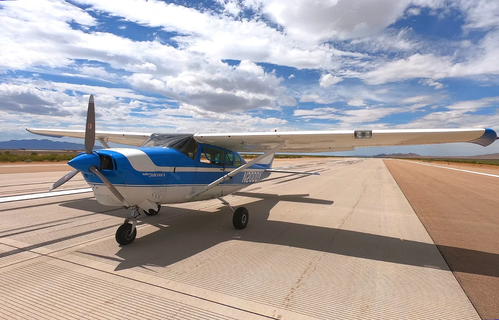 A 1968 Cessna 206 with ROBOpilot installed preparing for engine start on the runway at Dugway Proving Ground, Utah