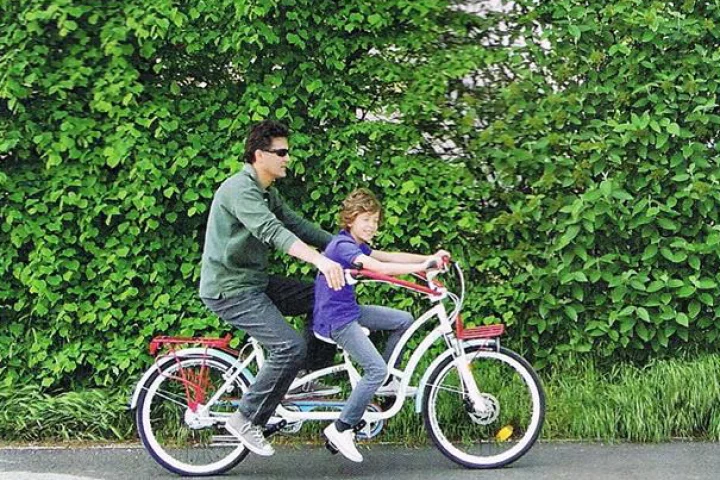 The Hugbike lets kids sit in front, while allowing parents to steer