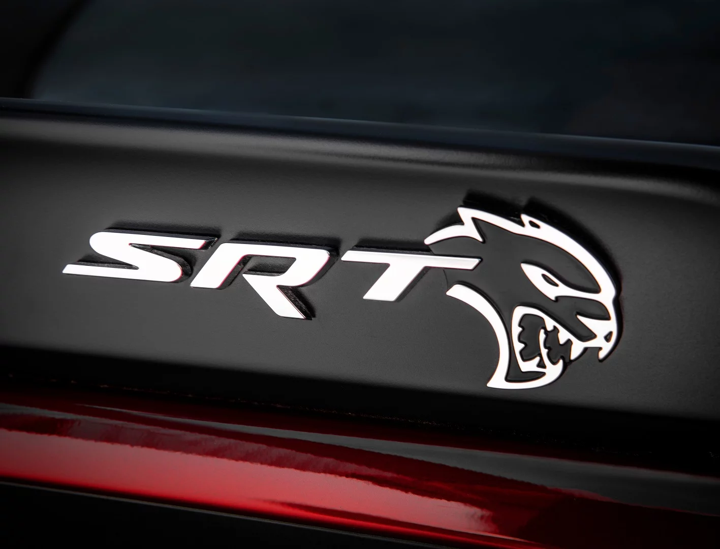 The Challenger SRT Hellcat Widebody has the same mean Hellcat badge as the standard car