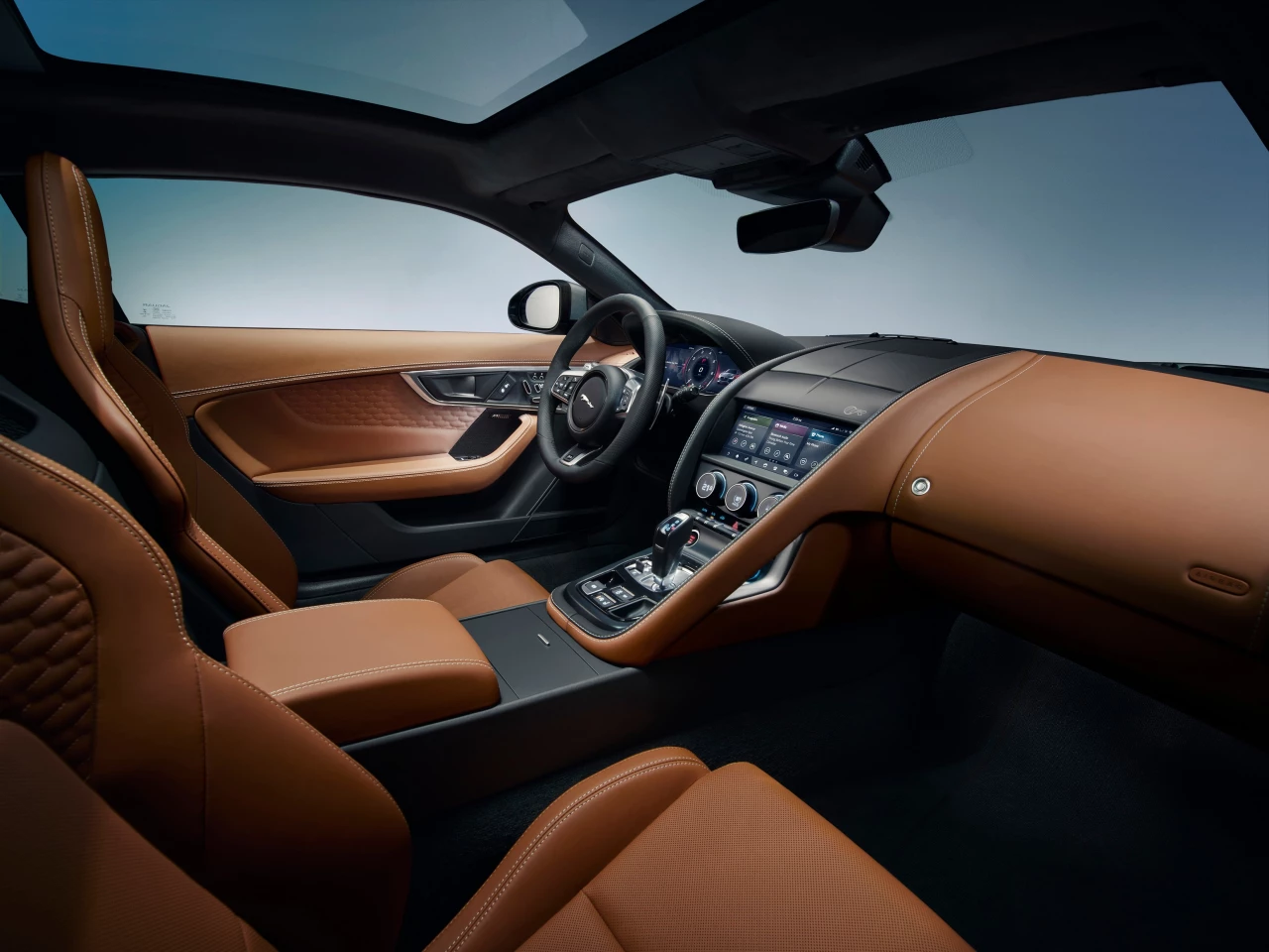 Jaguar calls the F-Type's driver-focused interior a "1 + 1" layout